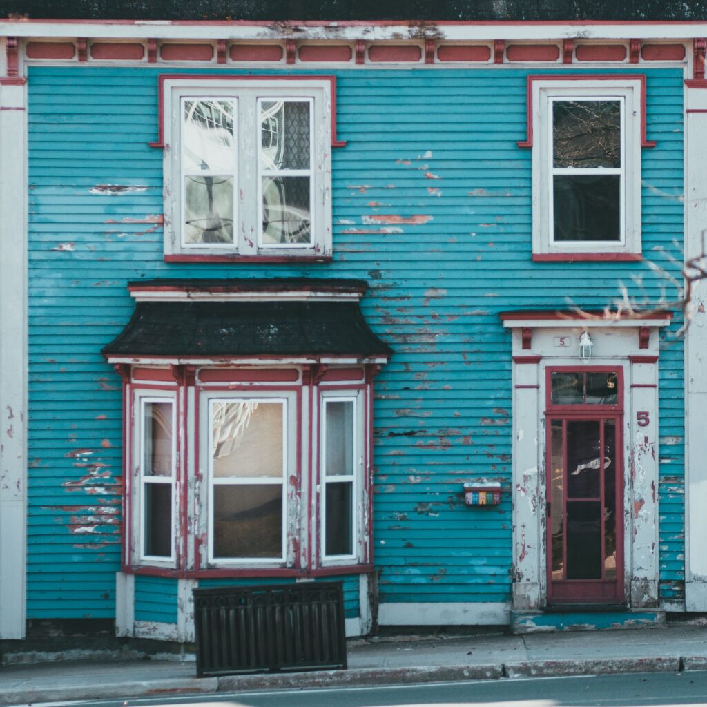 Historic home undergoing a major renovation with new wood framing and roof construction, representing Sendero Capital's financing solutions for fix-and-flip and ground-up residential investment projects.