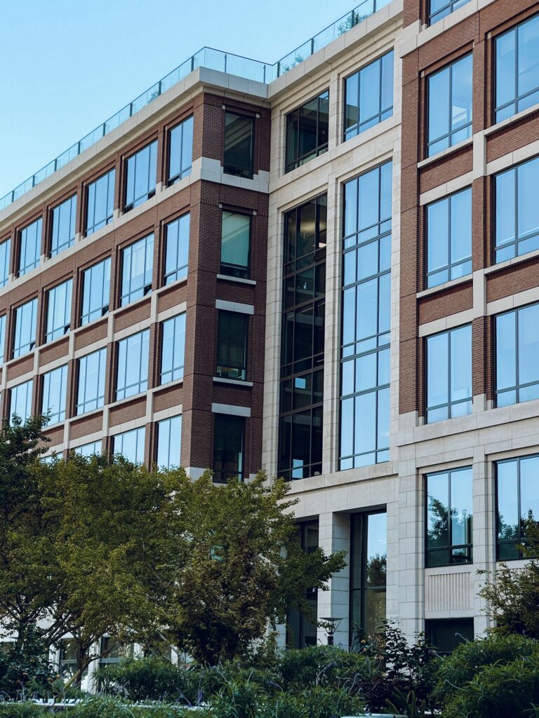 Modern commercial office building with contemporary architecture, representing Sendero Capital's financing solutions for commercial real estate acquisitions, refinancing, and investment properties.